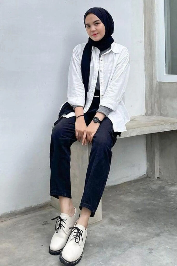 outfit hitam putih hijab celana jeans hitam